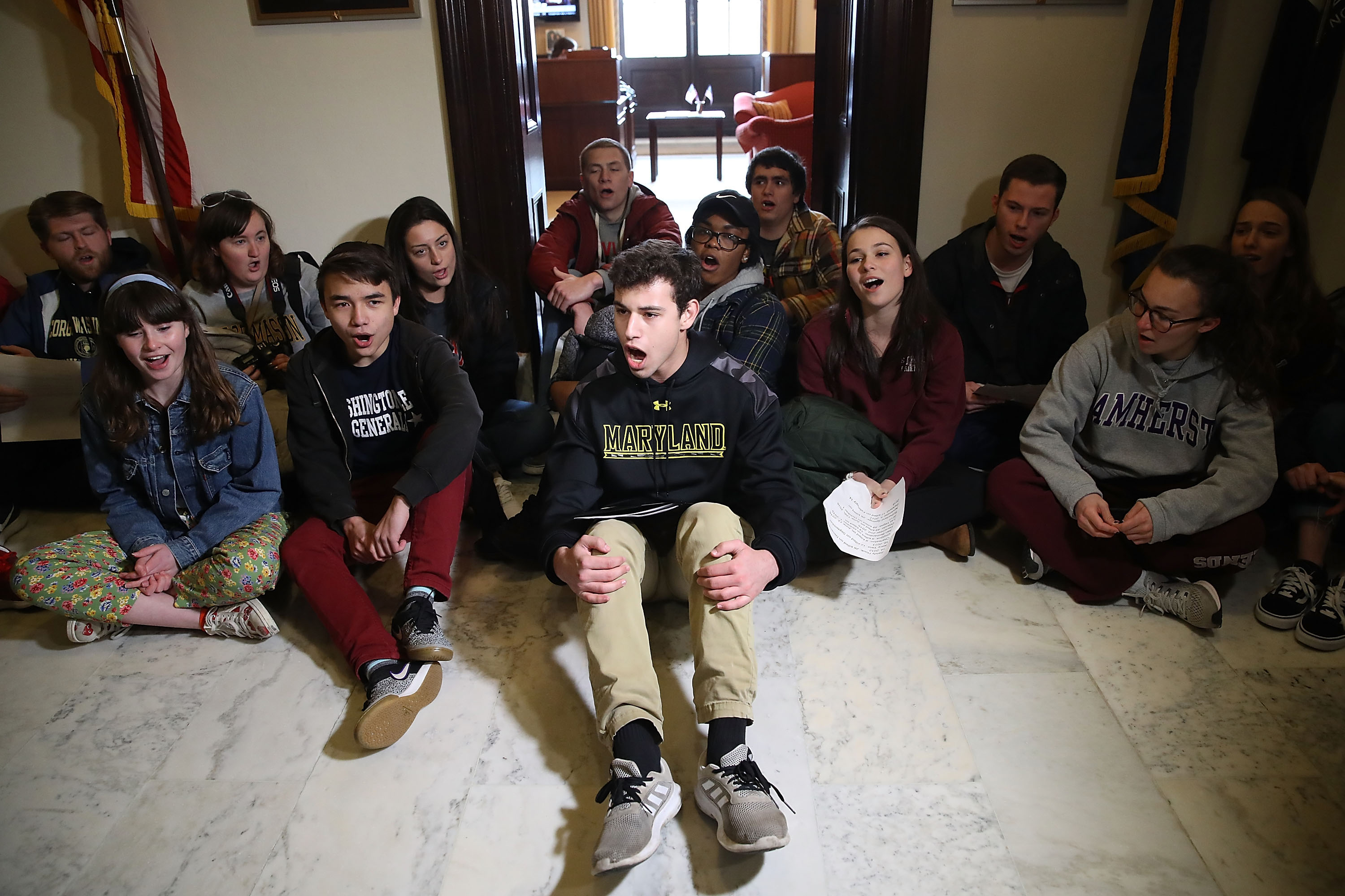 Today, students all over the country took part in 17-minute protests, one minute for each person who died in the high school massacre in Parkland, Florida. In this photo, students protest in front of Senate Majority Leader Mitch McConnell's (R-KY) office to urge Congress into changing gun laws on March 7 in Washington, D.C. (Mark Wilson/Getty Images)