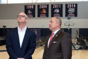 Athletic director David Benedict, right, takes Dan Hurley on a tour of the Werth Family Basketball Champions Center, the team's practice facility.