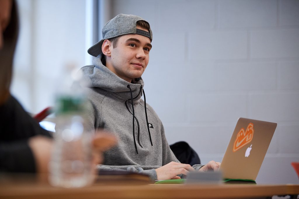 Maxim Letunov attends a communication class at Monteith Hall on March 23, 2018. (Peter Morenus/UConn Photo)