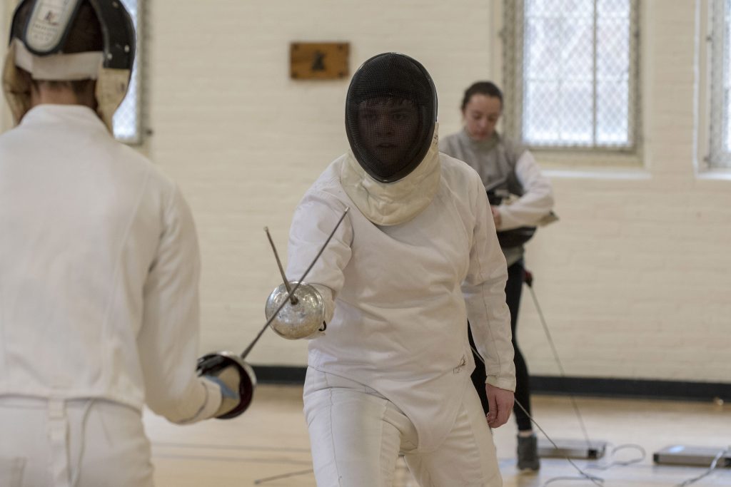 Glenn Thierfeldt, a sophomore electrical engineer, at the Willis Nichols Hawley Armory for fencing practice on March 4, 2018. (Garrett Spahn/UConn Photo)