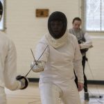 A bout starts with the fencers in the en-garde position, 4 metres (or 13.1 feet) apart. During a bout, the fencers move up and down a piste, or fencing strip. (Garrett Spahn '18 (CLAS)/UConn Photo)