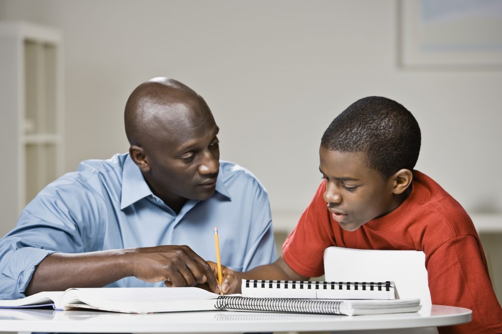 A new study finds that one size does not fit all students when it comes to parents helping with homework, and that parental involvement can be particularly beneficial for economically disadvantaged students. (Getty Images)
