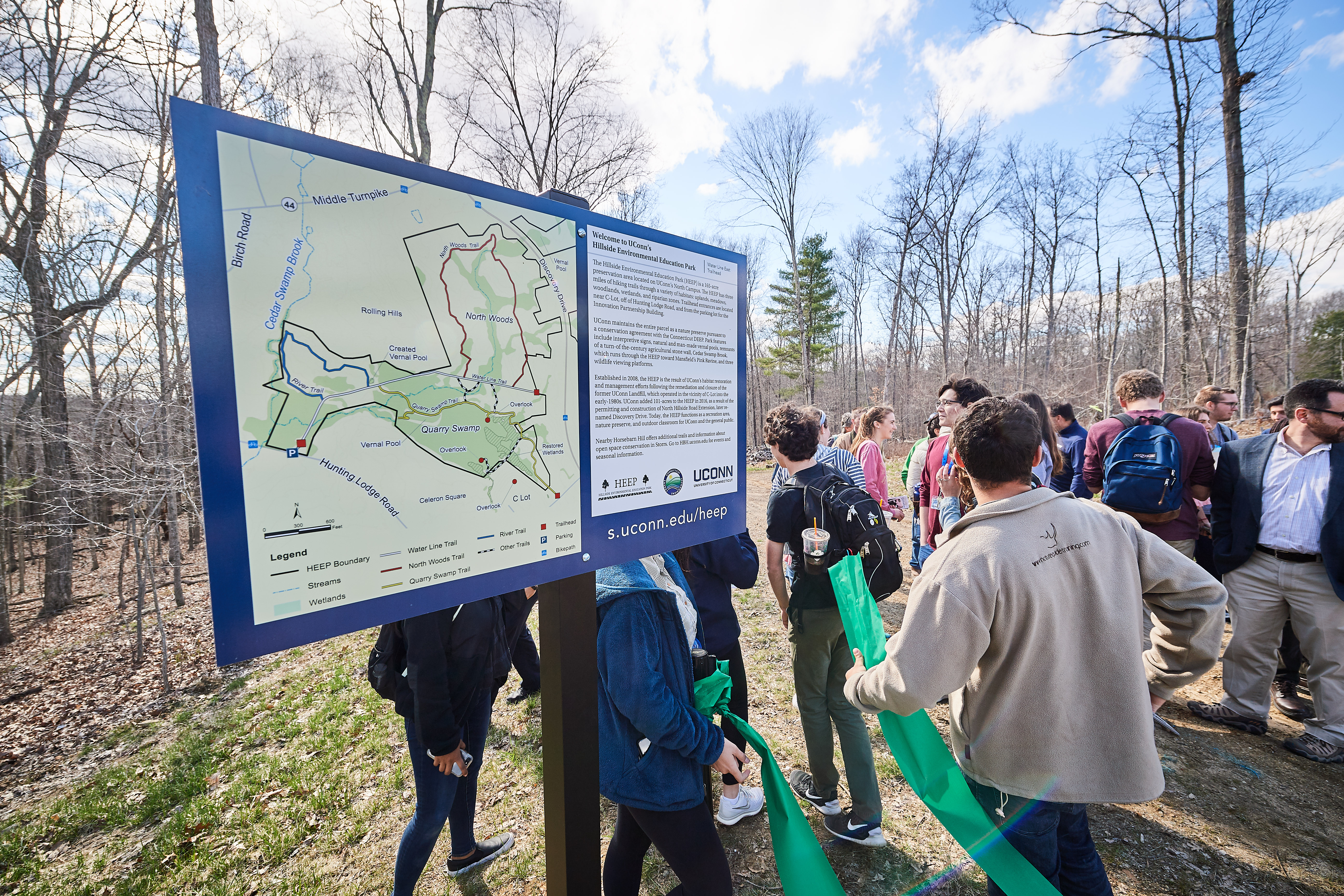 A group hike following the reopening of the Hillside Environmental Education Park trail near the Innovation Partnership Building on April 26, 2018. (Peter Morenus/UConn Photo)