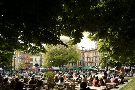 Outdoor cafes in Place Saint-Georges, Toulouse, France.