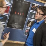 Matthew Bilmes, right, a senior digital media and design major, talks about his original short science fiction film 'Exit.' (Garrett Spahn '18 (CLAS)/UConn Photo)
