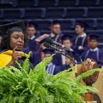 Kimberly Bryant, founder and executive director of Black Girls Code, gives the address at the School of Engineering Commencement ceremony. (Peter Morenus/UConn Photo)