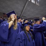 Graduates cheer at the end of the School of Engineering Commencement ceremony. (Peter Morenus/UConn Photo)