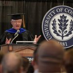 Ken Lalime '79 (PHR) gives the address at the School of Pharmacy undergraduate Commencement ceremony at Rome Ballroom on May 5. (Peter Morenus/UConn Photo)