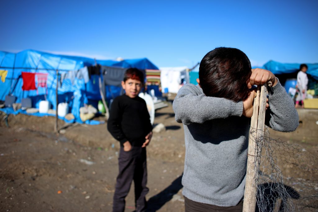 A sad little boy in a Syrian refugee camp in Turkey. (Getty Images)
