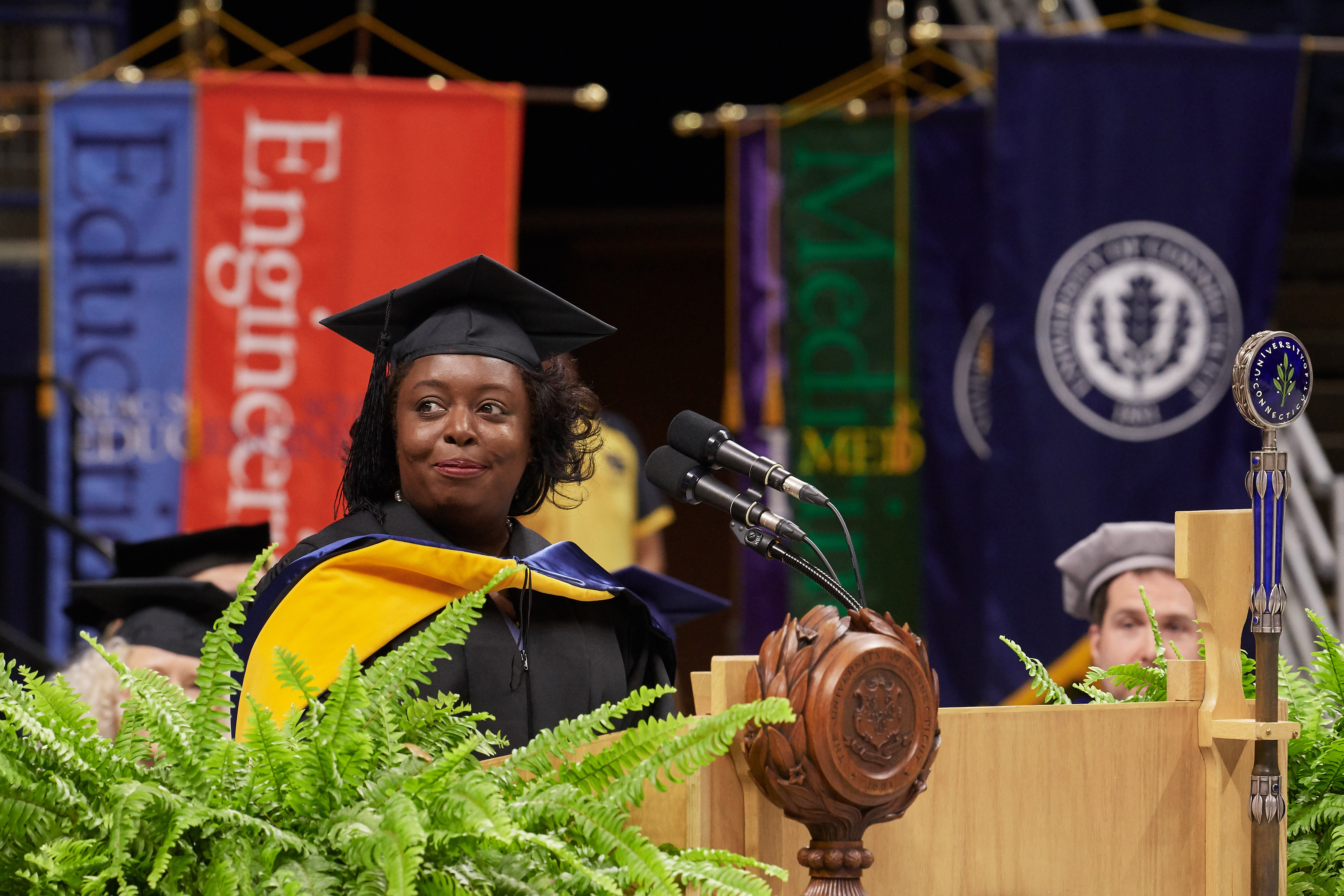 Kimberly Bryant, founder and executive director of Black Girls Code, gives the address at the School of Engineering Commencement ceremony at Gampel Pavilion on May 5, 2018. (Peter Morenus/UConn Photo)