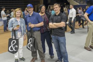 From left, Lynn Chapdelaine, Tom Fearney, Amber Whitehead,  and Dan Brierley, all of the Accounting Office, pose for a picture at Employee Appreciation Day. (Sean Flynn/UConn Photo)