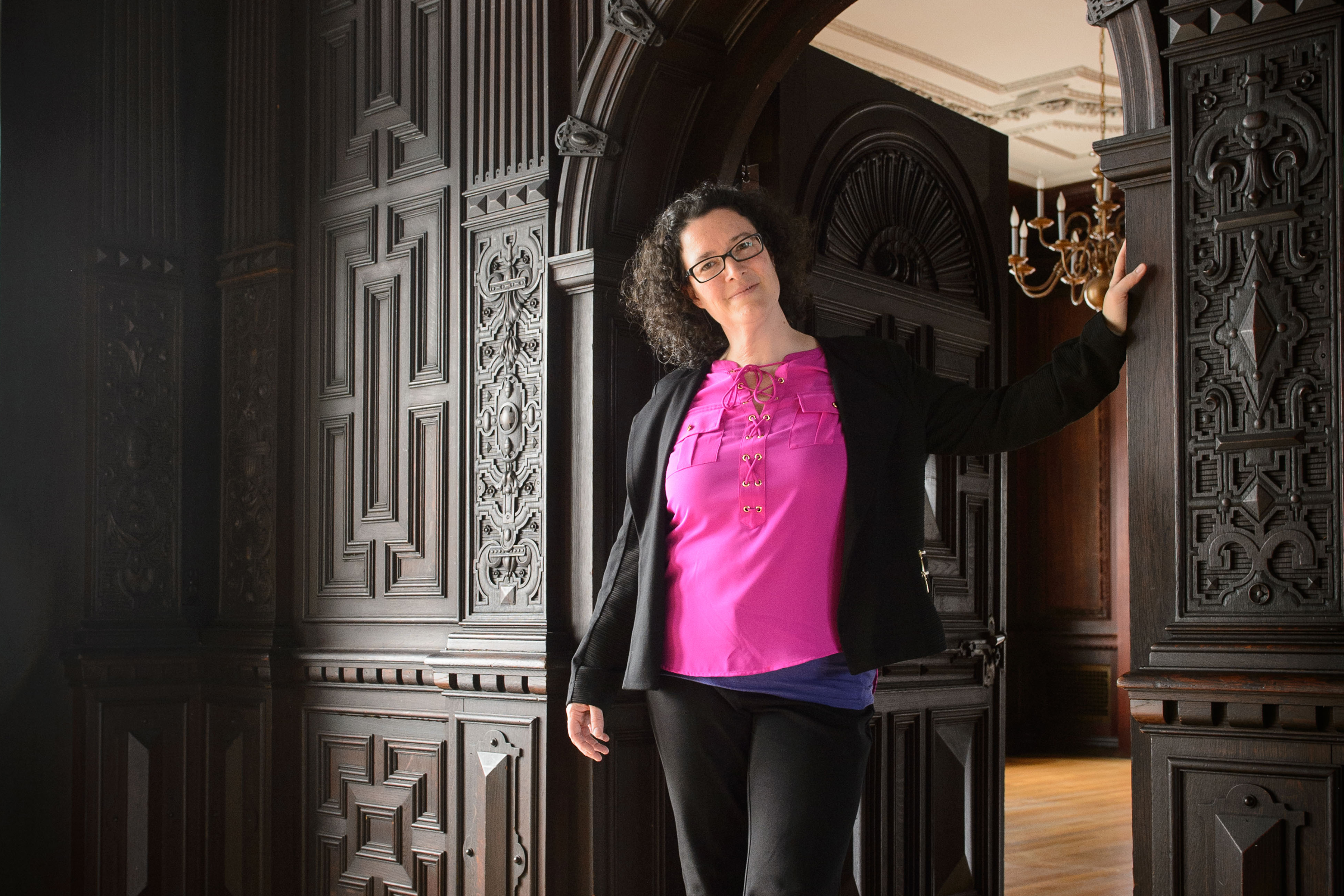 Pamela Bedore, associate professor of English, at the Branford House on Avery Point campus on. (Peter Morenus/UConn Photo)