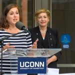 State Senator Mae Flexer '02 (CLAS) speaks at the dedication of the Engineering & Science Building on June 11, 2018. At Right is President Susan Herbst. (Peter Morenus/UConn Photo)