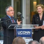 State Rep. Vincent Candelora speaks at the dedication of the Engineering & Science Building on June 11, 2018.  At Right is President Susan Herbst.  (Peter Morenus/UConn Photo)