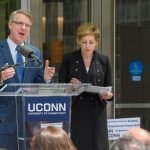 State Rep. Tim Ackert speaks at the dedication of the Engineering & Science Building on June 11, 2018.  At Right is President Susan Herbst. (Peter Morenus/UConn Photo)