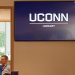 A video display at the UConn Hartford Library inside the Hartford Public Library. (Peter Morenus/UConn Photo)