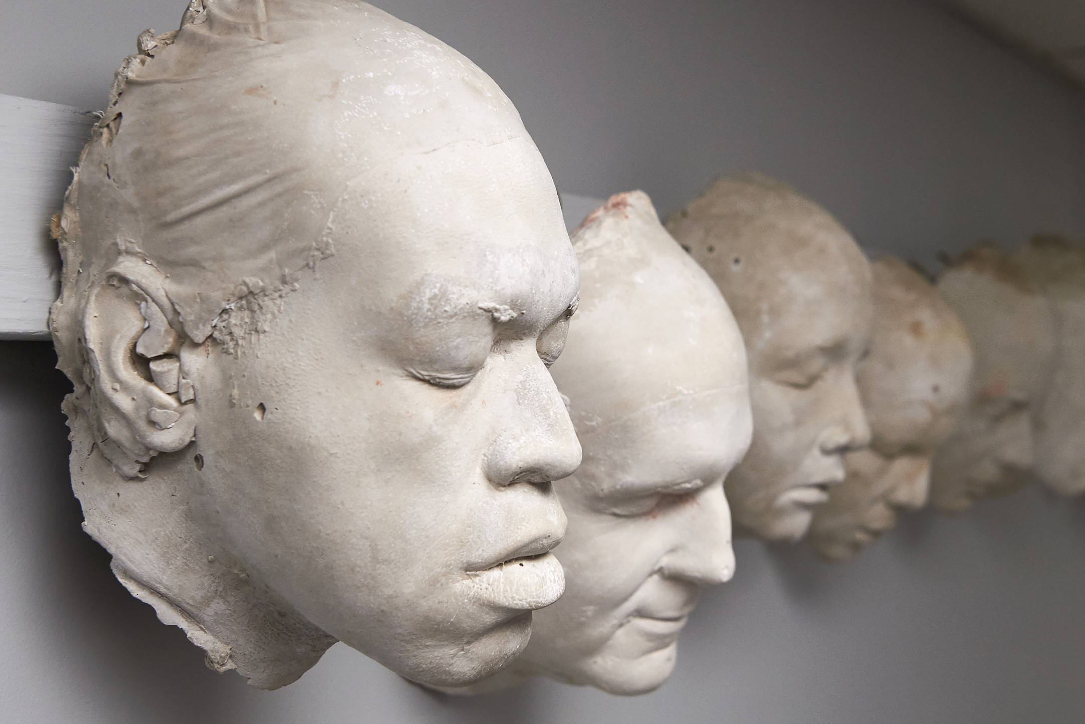 A row of plaster cast heads is among 27 campus treasures and oddities for you to identify. (Peter Morenus/UConn Photo)