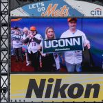 UConn alumni seen on the jumbotron at a  New York Mets baseball game at Citi Field in Queens New York on June 3, 2018. (Peter Morenus/UConn Photo)