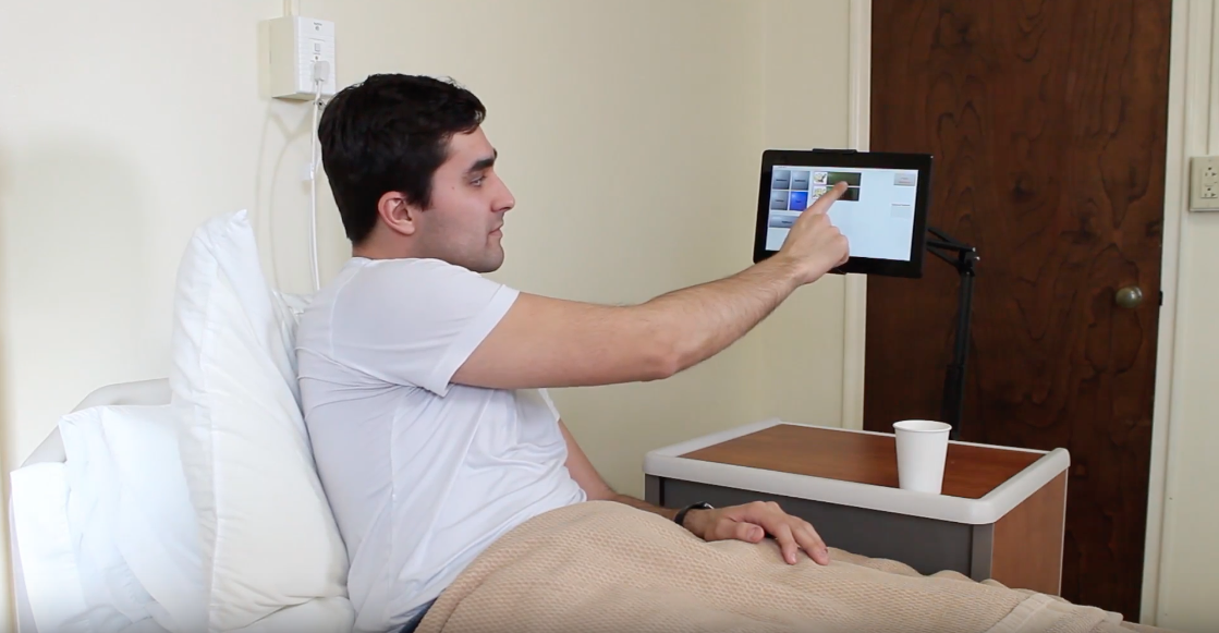 YouCOMM Co-founder Daniel Yasoshima is seen here demonstrating the device in a hospital setting.