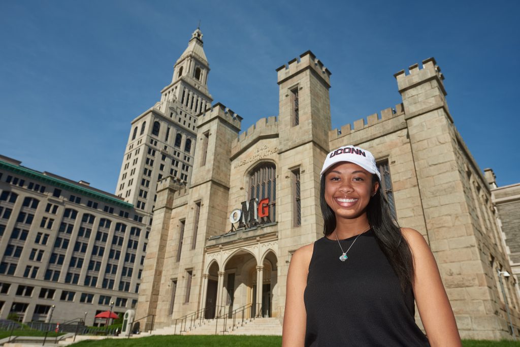 A student stands outside the Wadsworth Atheneum in Hartford. (Peter Morenus/UConn Photo)