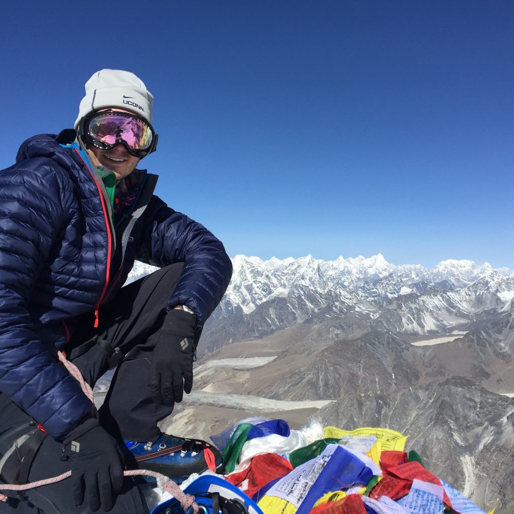 Connor Walker at the summit of Island Peak.