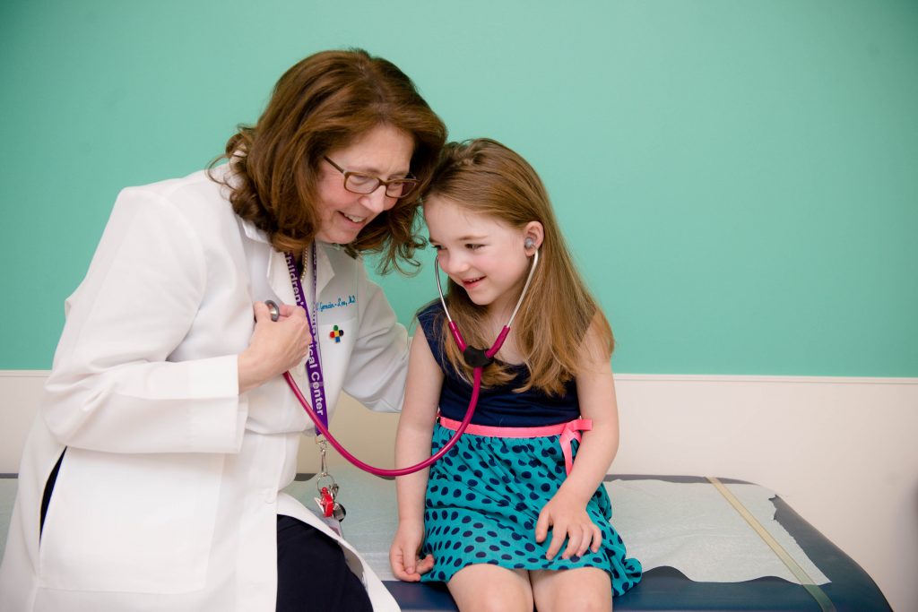 Dr. Emily Germain-Lee with a patient at the Albright Center, Connecticut Children's Medical Center. (CCMC Photo)