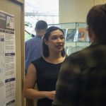 Keiona Khen, a nutritional sciences major in the College of Agriculture, Health, and Natural Resources, speaks about her research at the McNair Scholars Poster Session on July 25, 2018. (Christine Buckley/UConn Photo)