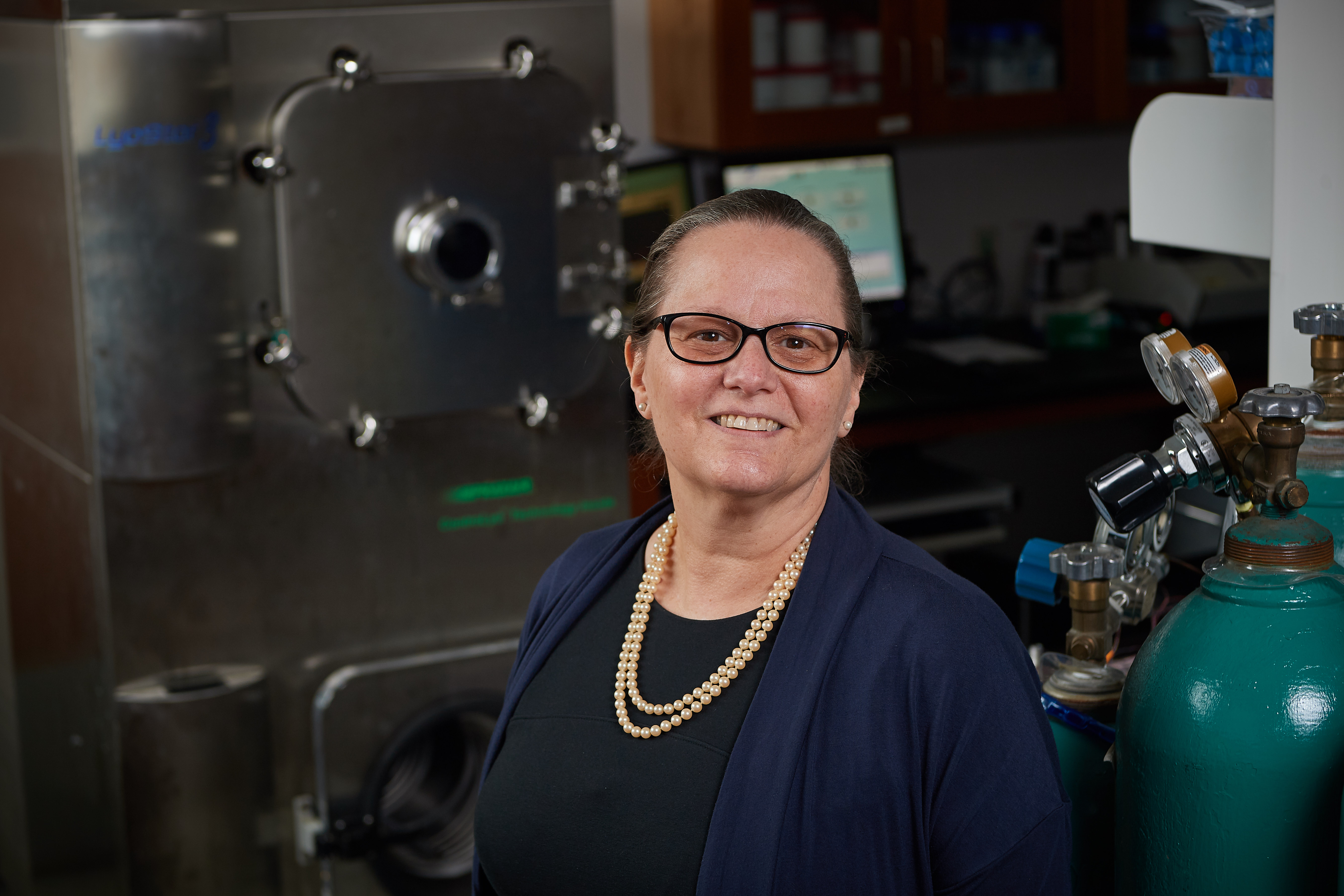 Robin Bogner, professor of pharmaceutical sciences, at her lab in the Pharmacy/Biology Building on Aug. 31, 2018. (Peter Morenus/UConn Photo)