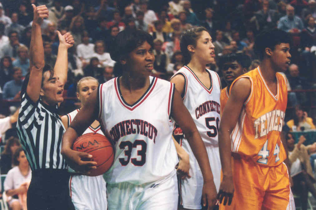 UConn Huskies Jamelle Elliott and Rebecca Lobo play against the Tennessee Lady Vols in 1995, the year UConn won its first national championship. After a 12-year hiatus, the UConn and Tennessee women's basketball programs will resume their historic series beginning in 2019-20. (Athletic Communications Photo)