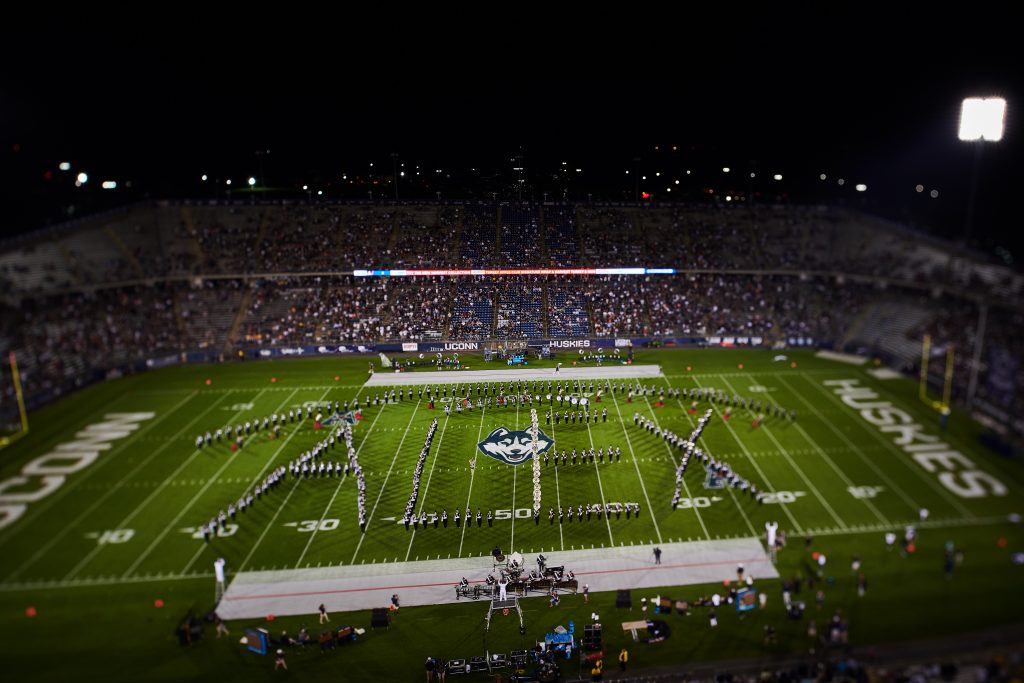 The UConn Marching Band paid tribute to Alex Schachter, a Husky fan who played in his school marching band, by spelling out his name and performing his favorite song at halftime. (Peter Morenus/UConn Photo)