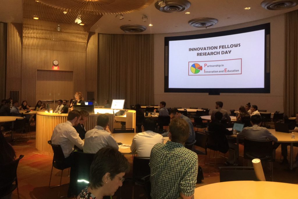 Dr. Caroline Dealy kicks off the inaugural 'Innovation Fellows Research Day' of the new Partnership for Innovation and Education (PIE) program in the Academic Rotunda at UConn Health. (Lauren Woods/UConn Health Photo)