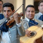 Erick Castro, left, and Rodbel Virula of the Mariachi Mexico Antiguo Band play to a full crowd at the Hartford Campus on Aug. 29, 2018. (Sean Flynn/UConn Photo)