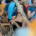 Freshman Melisa Rivera ’22 (CLAS) enjoys the celebration that welcomed new students to the Hartford Campus. (Sean Flynn/UConn Photo)