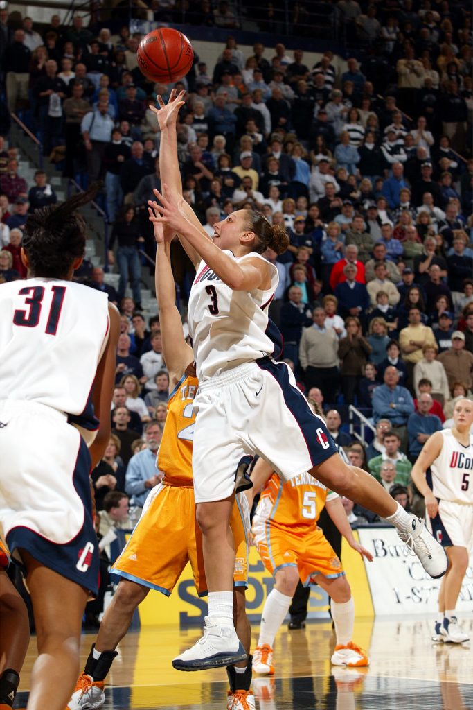 Diana Taurasi drives to the hoop during a UConn/Tennessee match-up in 2003. (Athletic Communications Photo)