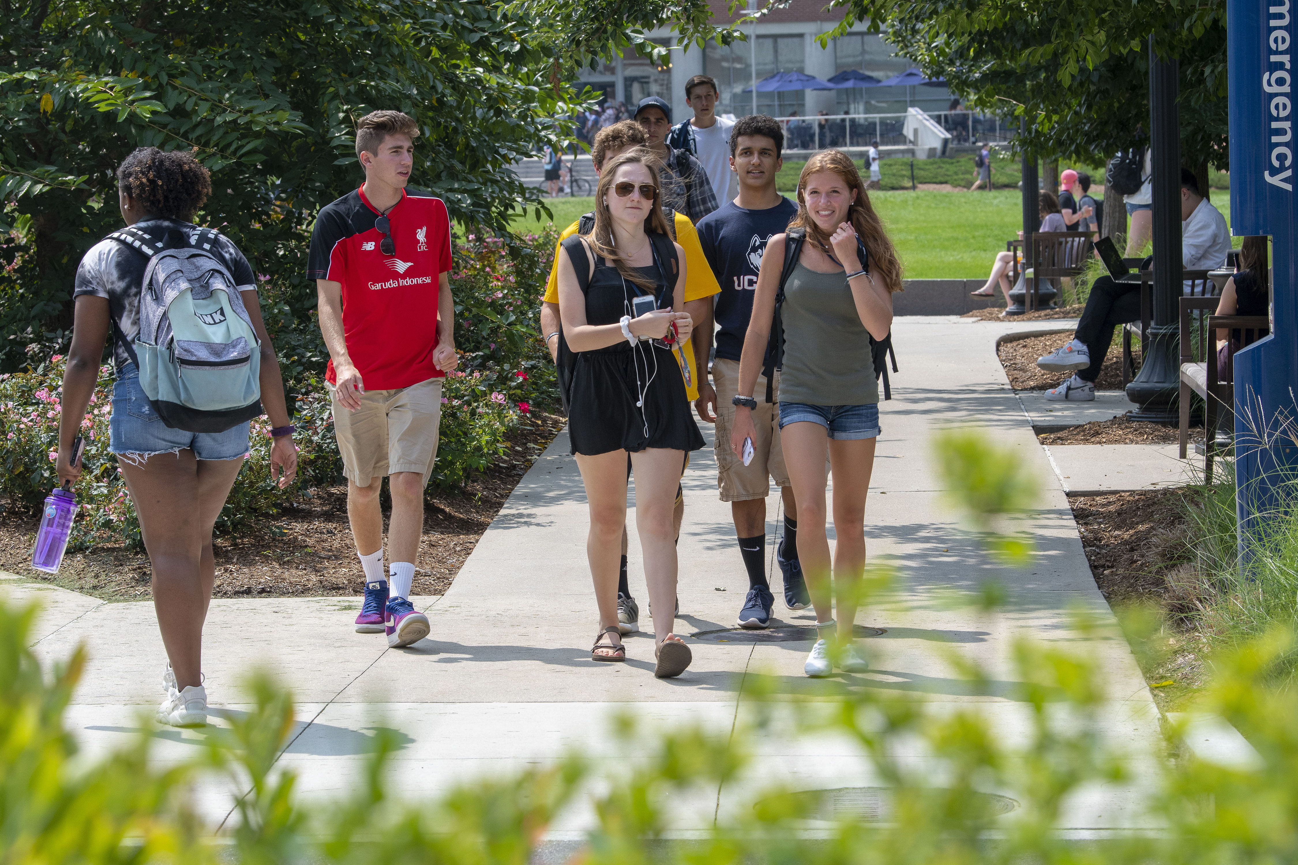 Students walking on campus on Aug. 27, 2018. (Sean Flynn/UConn Photo)