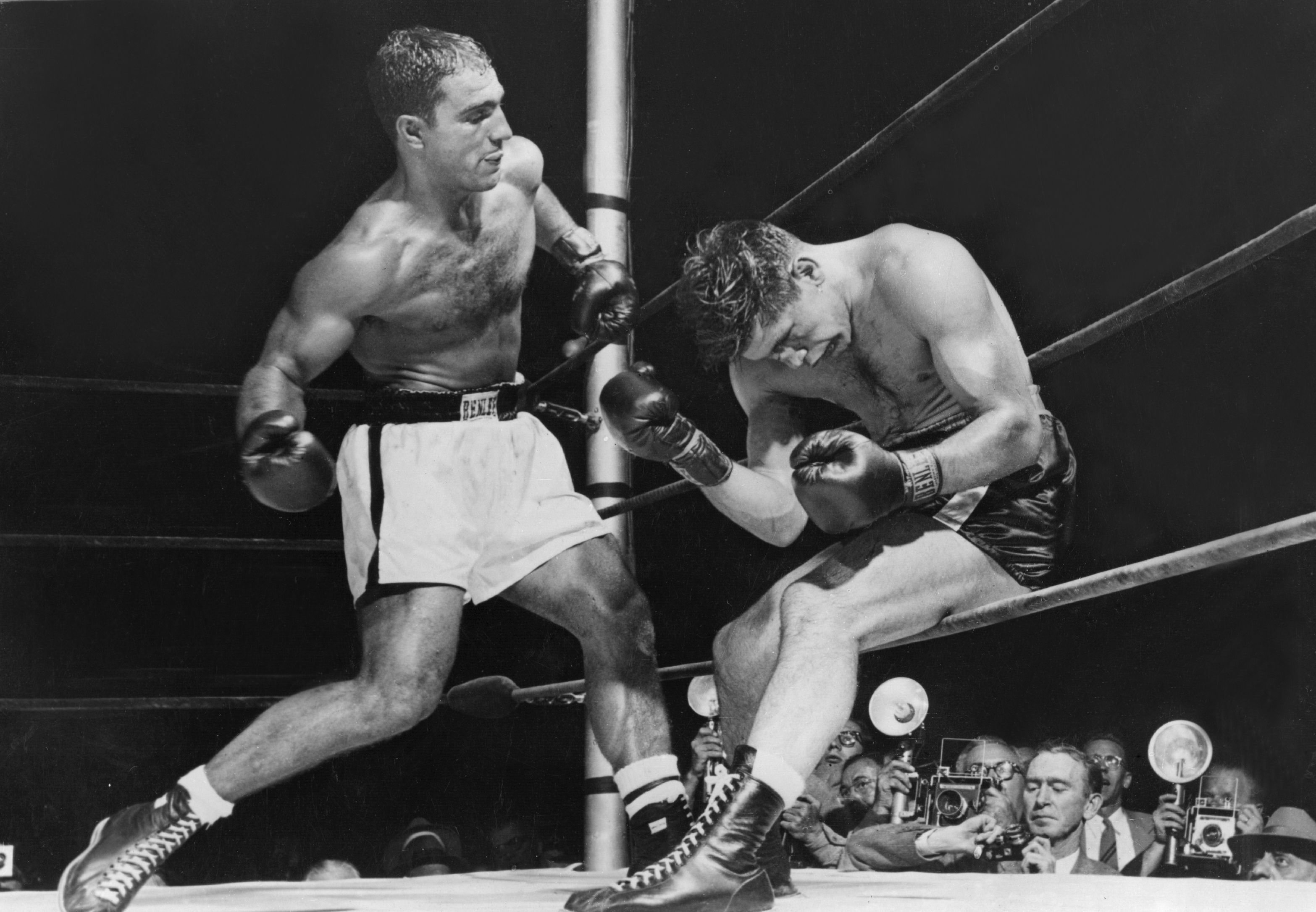 American boxer Rocky Marciano, left, beat Roland La Starza to retain the world heavyweight title in 1953. (Keystone/Getty Images)