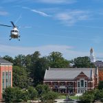A group of students, faculty and staff take off for a ride in a Sikorsky S-76 helicopter from the Student Union Mall as part of Lockheed Martin Day on Sept. 27, 2018. (Peter Morenus/UConn Photo)