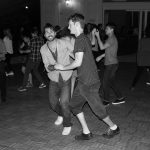 Sean McCurdy, a visiting graduate student from the University of Washington, right, leads recent graduate Chris Myers '17 (BUS) on a dance. (Lucas Voghell/UConn Photo)