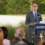 Pamir Alpay, executive director of the Innovation Partnership Building, speaks at the dedication ceremony of the IPB. (Peter Morenus/UConn Photo)
