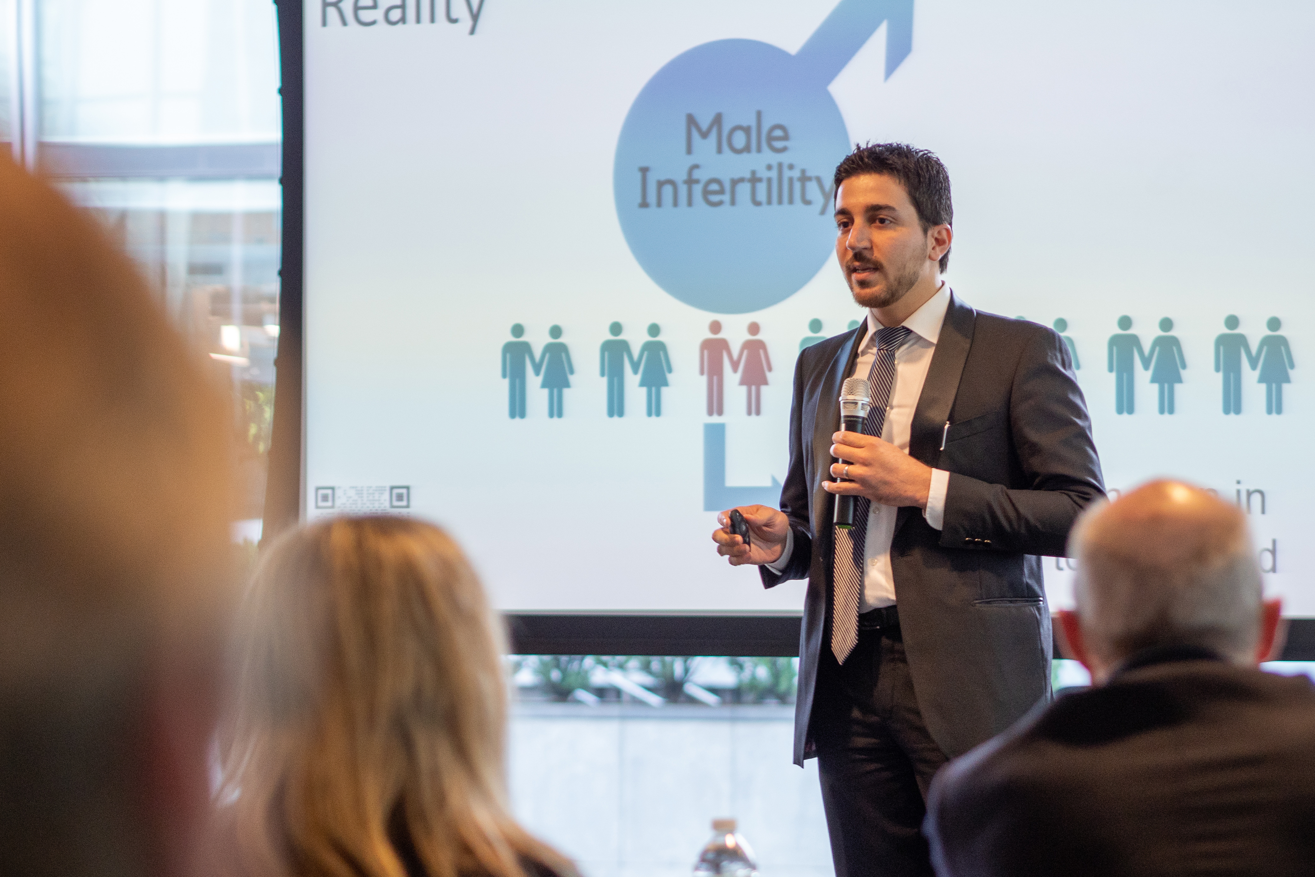 Engineering doctoral student Reza Amin presents the QRFertile concept to a panel of judges during the Wolff New Venture Competition. (Eric Olson for UConn)