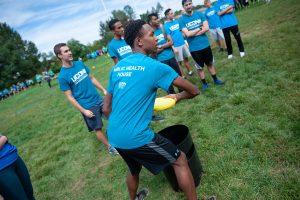 Timothy Mason of Public Health House prepares to throw a flying disc in a Kan Jam competition. (Defining Studios Photography for UConn)