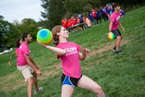 Sarah Dowling, a member of Leadership House, participates in a dodgeball competition. (Defining Studios Photography for UConn)