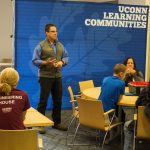 Marc Cournoyer of UConn Extension instructs the groups on how to go about programming their LEGO Mindstorm kits. (Lucas Voghell '20 (CLAS)/ UConn Photo)