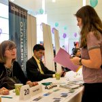 Kathryn Libal, director of the Human Rights Institute and associate professor of social work, speaks with a student at the Major Fair in the Student Union Ballroom on Wednesday, Oct. 10. (Nicholas Hampton '19 (CLAS)/UConn Photo)
