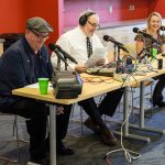 The cast of UConn360 Podcast, from left, Tom Breen, Ken Best, and Julie Bartucca, began the session by reading Homecoming headlines from bygone years. (Lucas Voghell '20 (CLAS)/UConn Photo)