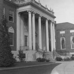 The portico of Wilbur Cross Library in 1943, showing the North Reading Room with drapes at the windows. (University Library Archives & Special Collections)