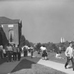 Students walk in front of Wilbur Cross Building in 1950. (University Library Archives & Special Collections)