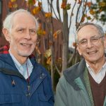 Greg Anderson, Distinguished Professor Emeritus of Ecology and Evolutionary Biology, left, and Richard Brown, Distinguished Professor Emeritus of History, at the ceremonial planting of the Class of 2019 tree near the William H. Hall Building on Oct. 23, 2018. (Peter Morenus/UConn Photo)