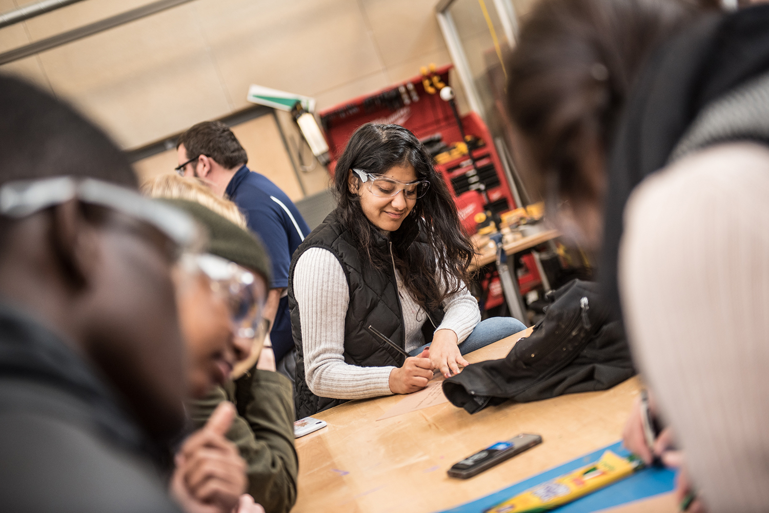 Students from eight universities, two of them international, participated in an ice-breaker at the Makerspace experimental lab at the Werth Tower, as a prelude to the Annual UConn CIBER Case Challenge. (Nathan Oldham/UConn School of Business)