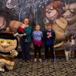A last group photo to conclude the day, with kids and parents posing in front of the Wild Things mural. (Lucas Voghell '20 (CLAS)/UConn Photo)